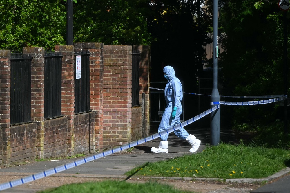 A police forensic officer works inside a cordon set up near Kenton United Synagogue in Harrow, northwest London (AFP/Getty)