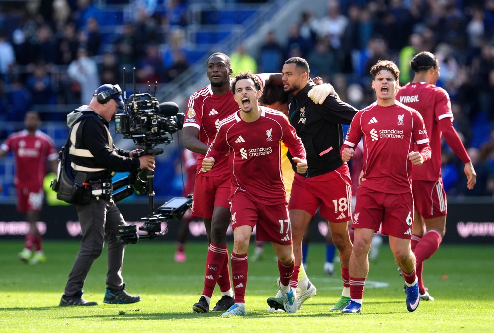 Liverpool celebrate victory at the Hill Dickinson Stadium (PA)