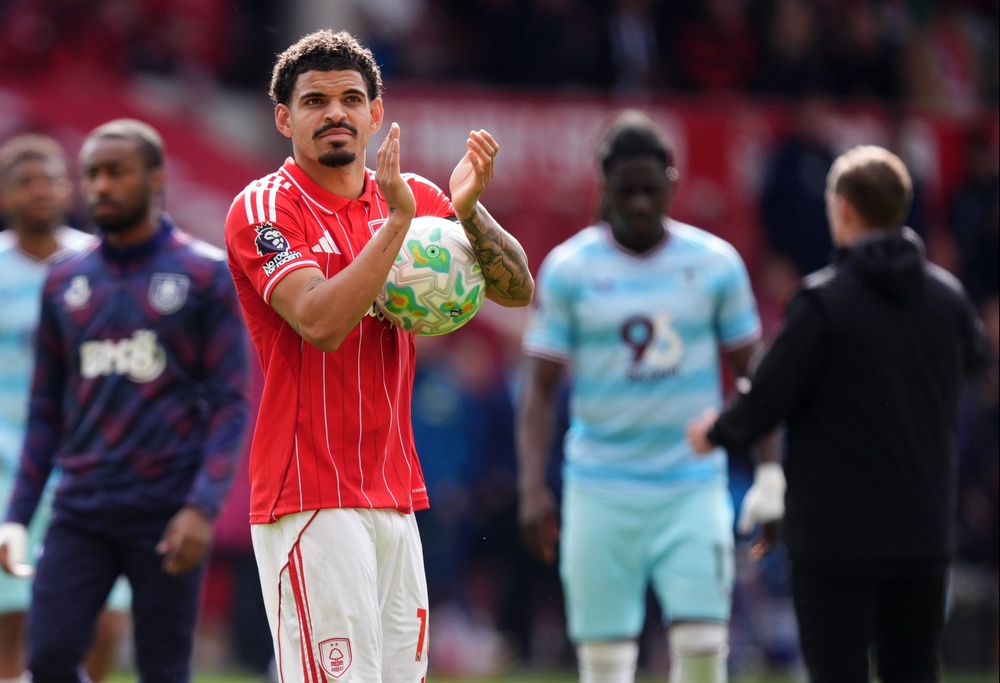 Gibbs-White celebrates with the match ball (Mike Egerton/PA) (PA Wire)