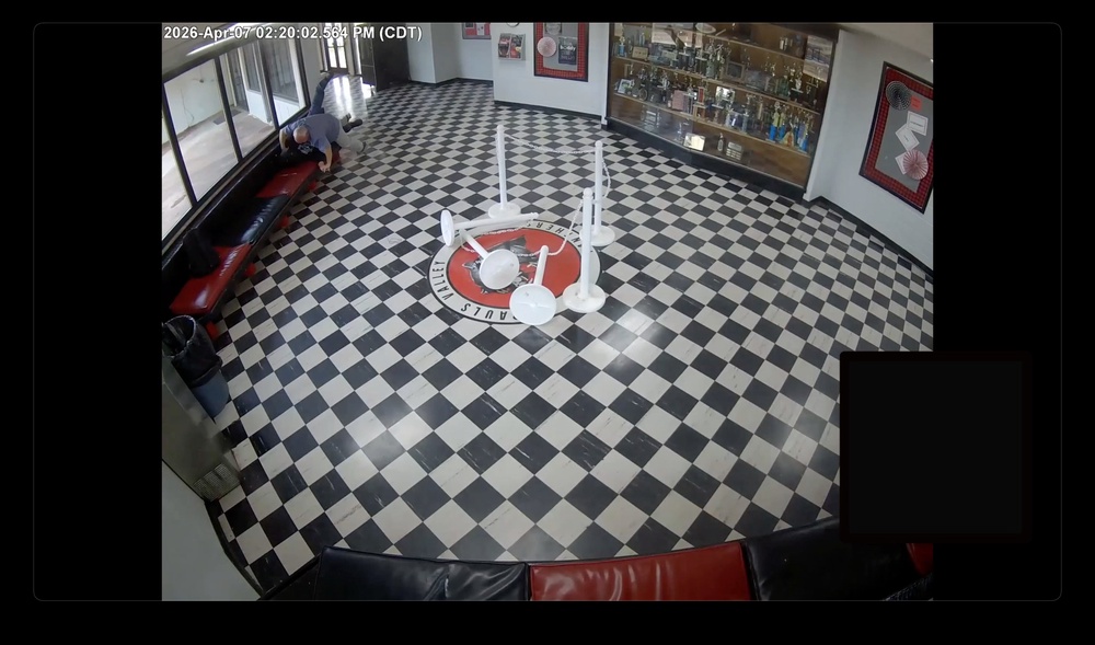 Surveillance video captured Moore tackling the would-be shooter to the ground earlier this month (AP)
