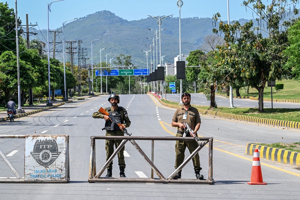 Police personnel stand guard at a closed road leading to the Serena Hotel in the Red Zone area of Islamabad on April 19, 2026. A second round of talks between the United States and Iran is expected in Islamabad this coming week. (AFP via Getty Images)