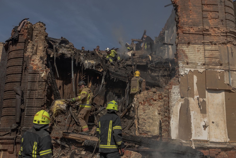 Ukrainian rescuers work at the site of heavily damaged buildings following a Russian air attack in Dnipro, on 16 April 2026, amid the Russian invasion of Ukraine (AFP via Getty Images)