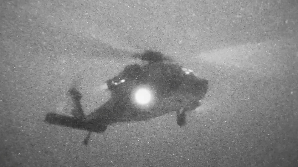 A helicopter carries U.S. Marines from the amphibious assault ship USS Tripoli at an unknown location (U.S. Central Command/X)