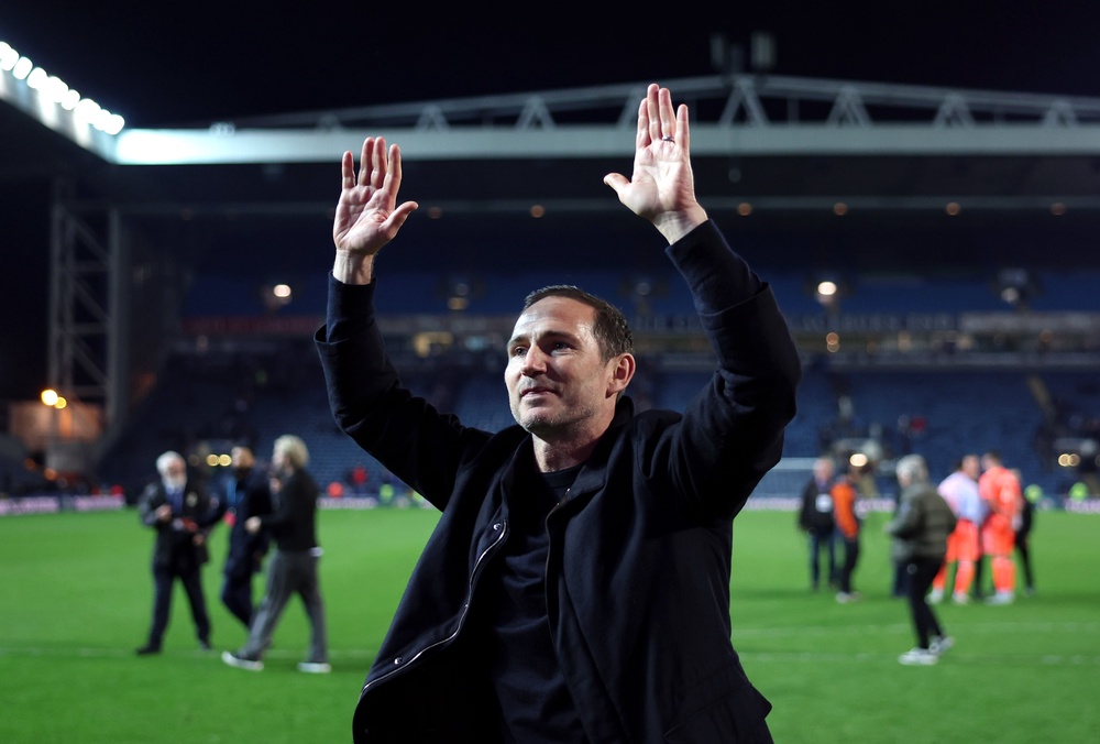 Lampard salutes the Coventry fans after confirming promotion at Ewood Park (Getty)