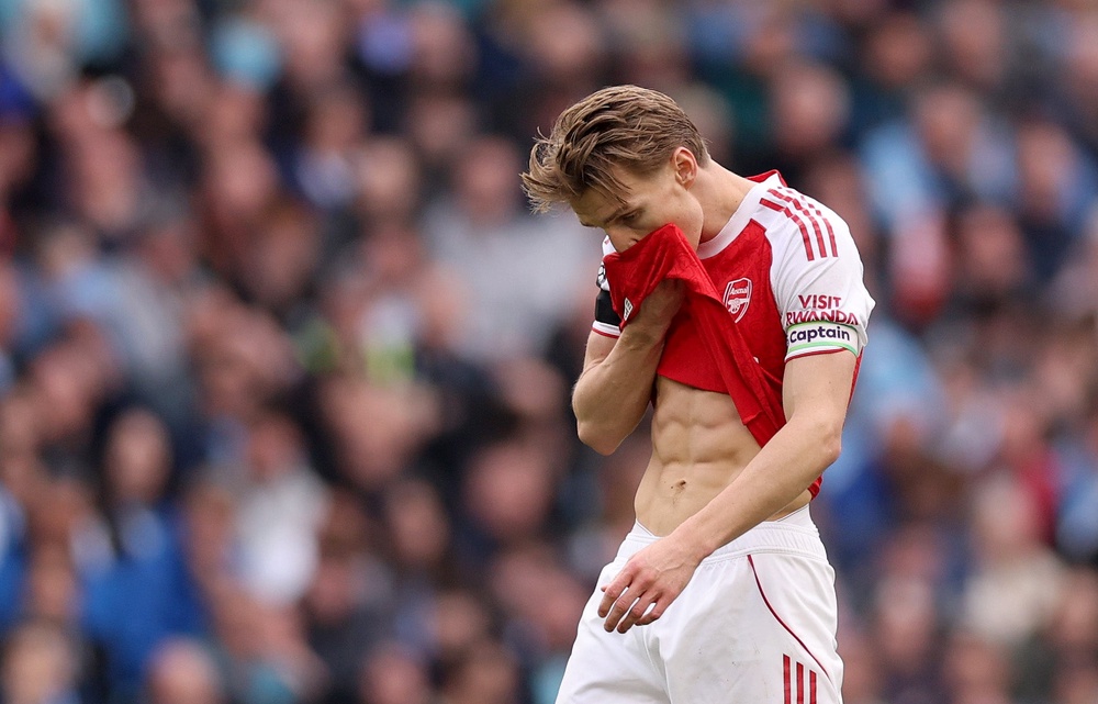 Odegaard believes Arsenal can still win the title (Getty)