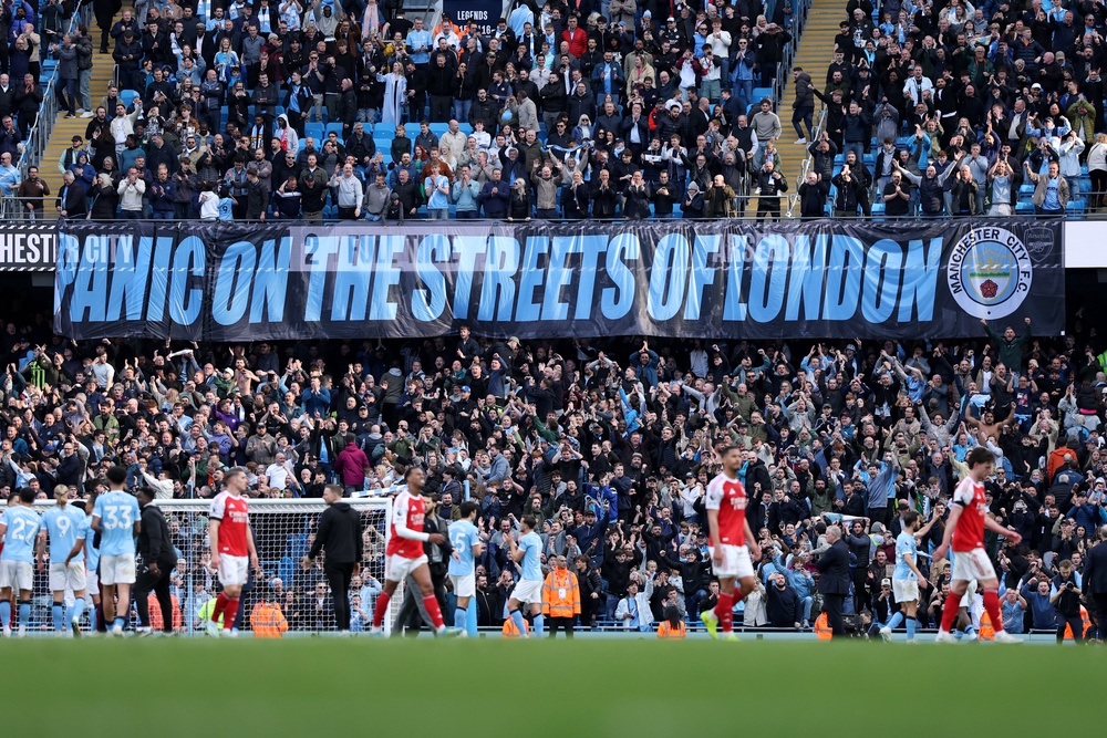 Man City fans unfurled a ‘panic on the streets of London’ banner to taunt Arsenal (Getty)
