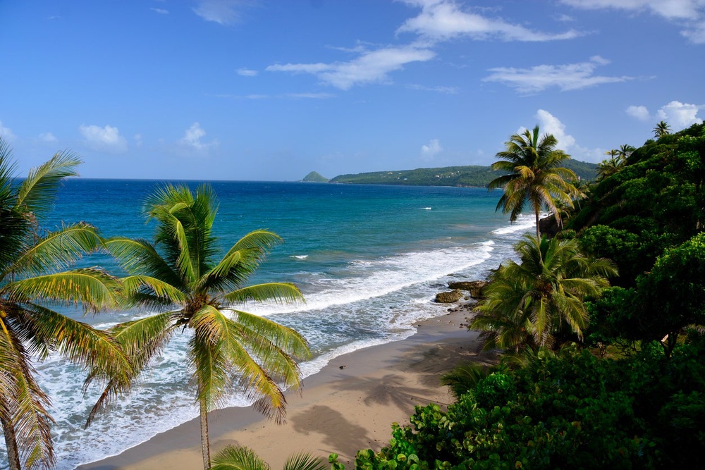 Grand Anse Beach in St. George’s, Grenada, where Waddell was last seen on security video entering the water near a pier (Getty/iStock)