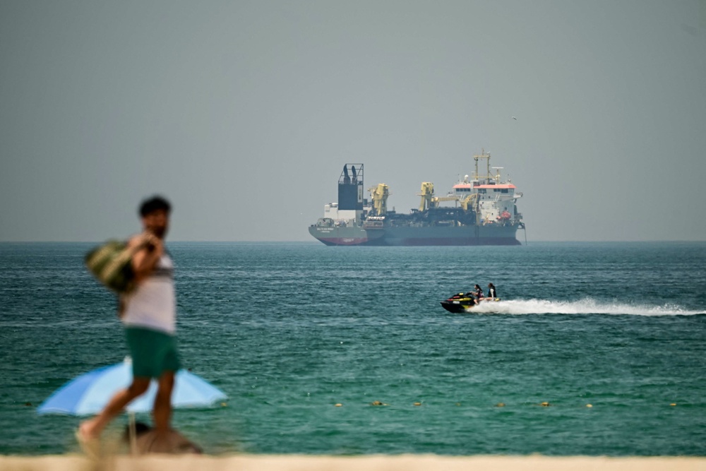 A cargo ship in the Strait of Hormuz, which Iran closed again on Sunday (AFP/Getty)
