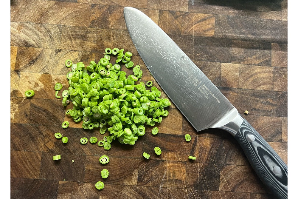 The handle helps easy chopping (Kate Ng/The Independent)