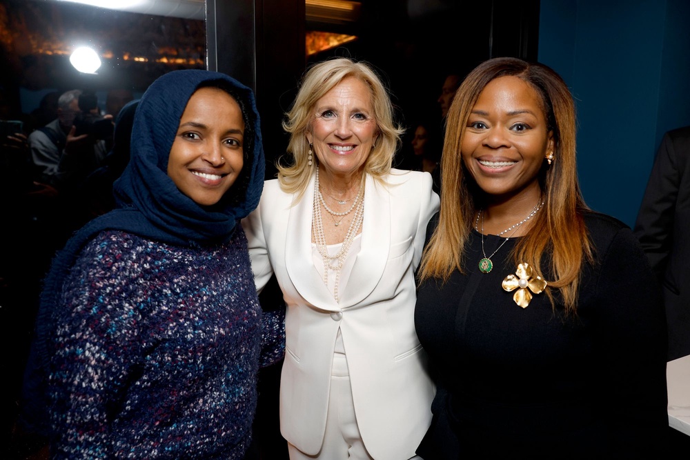 Congresswoman Sheila Cherfilus-McCormick (right) is pictured with Congresswoman Ilhan Omar (left) and Jill Biden (Getty Images for ELLE)