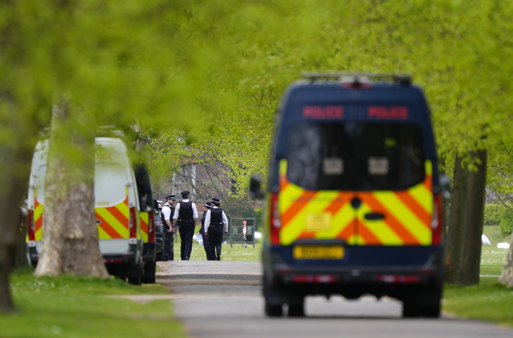 Police officers in Kensington Gardens on Friday after the park was temporarily closed off following the drone incident (Jordan Pettitt/PA) (PA Wire)