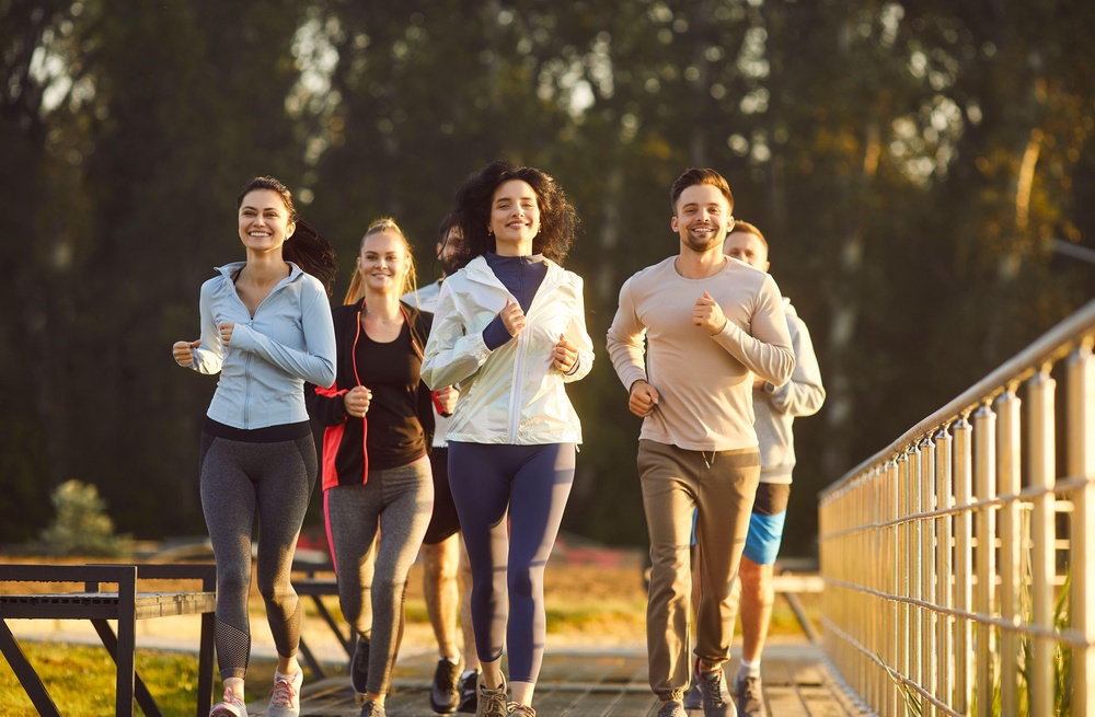 Making running a social occasion will help you stick to it (PA)