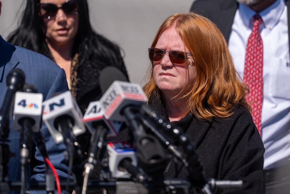 Ellerup listens to Attorney Robert Macedonio speak to the media outside Suffolk County Court after her estranged husband Rex Heuermann pleaded guilty (AFP/Getty)