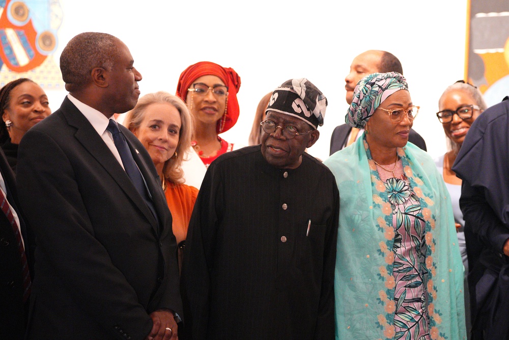 Tinubu (centre) visited the UK earlier this year (PA)