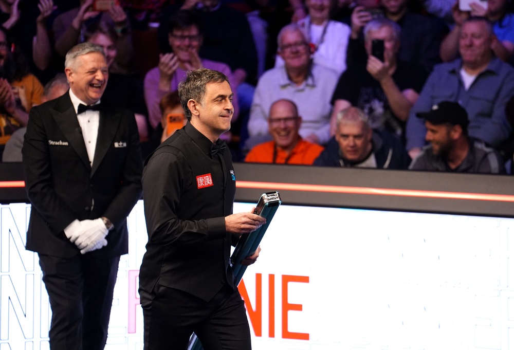 Ronnie O’Sullivan got his tables mixed up as he walked out to face He Guoqiang at the Crucible (Martin Rickett/PA)
