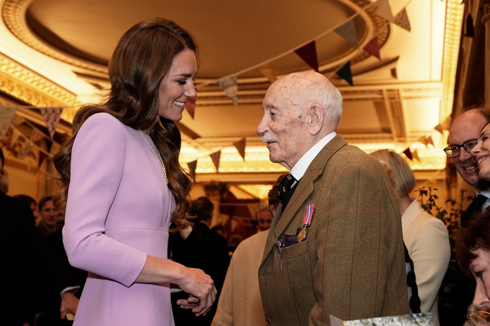 The Princess of Wales speaks to 100 year-old John Jervois at the reception (PA)