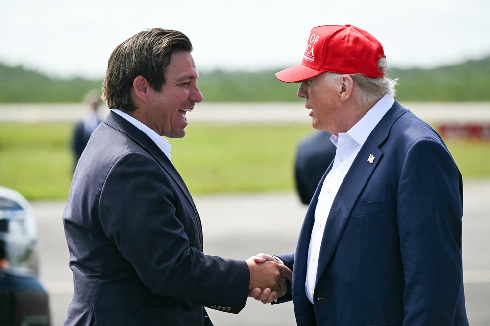 Florida Gov. Ron DeSantis gave his former mentor-turned-rival President Donald Trump a gift when the Florida legislature passed a new congressional map favorable to Republicans. (AFP/Getty)