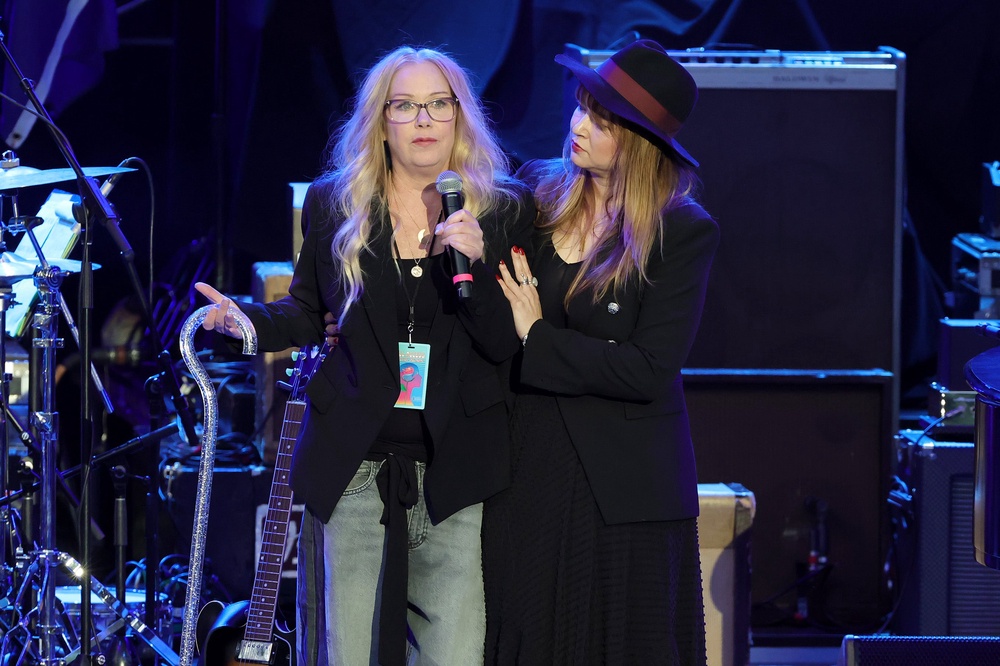 Christina Applegate, left, at the Light Up The Blues 7 Concert celebrating Autism Speaks' 20th Anniversary in Los Angeles (Getty)