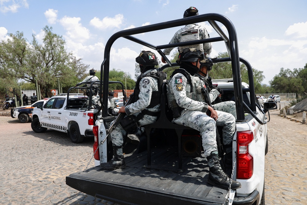 Members of the Mexican National Guard at the scene (Reuters)