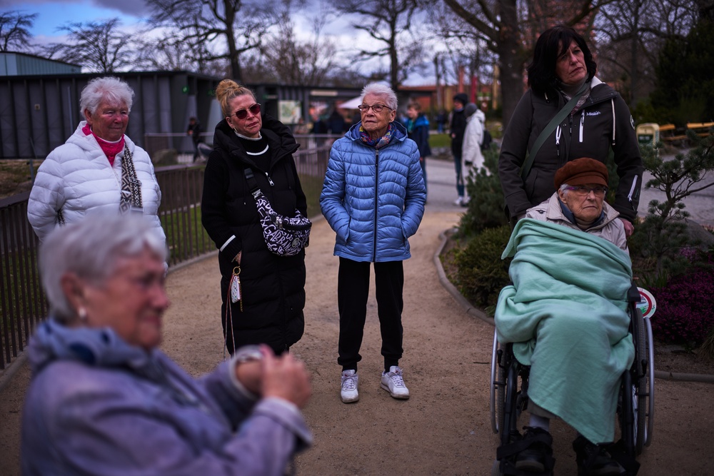 Krueger, Jansen and Barkow followed Malteser Berlin tour coordinator Carola Tembrink around the Berlin Zoo, accompanied by their daughters and a caregiver (AP)