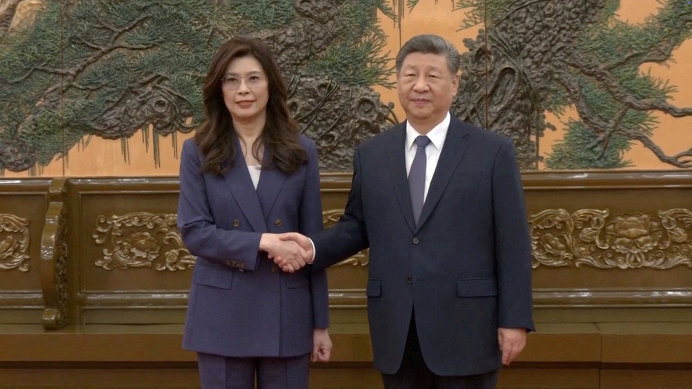 Cheng Li-wun, chair of the Kuomintang, Taiwan’s largest opposition party, shakes hands with Chinese president Xi Jinping at the Great Hall of the People in Beijing on 10 April (Reuters)
