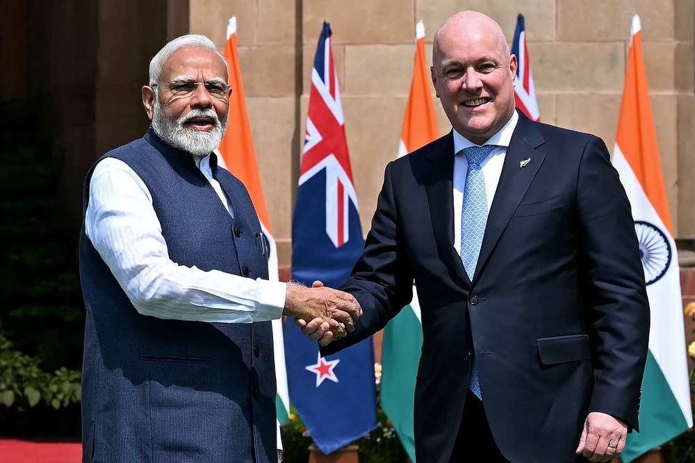 India's prime minister Narendra Modi shakes hands with his New Zealand's counterpart Christopher Luxon before their meeting at the Hyderabad House in New Delhi (AFP/Getty)