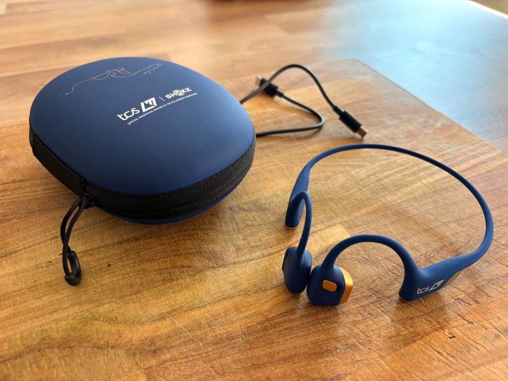 The Shokz openrun pro 2 London Marathon edition come with a charging cable and a swish carry case (Harry Bullmore/The Independent)