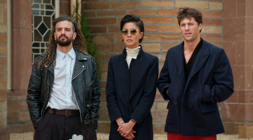 Mark Ballas and Kristen Kish, pictured with their 'Traitors' co-star Rob Rausch, won't appear together on 'Dancing With the Stars' anytime soon (Peacock)