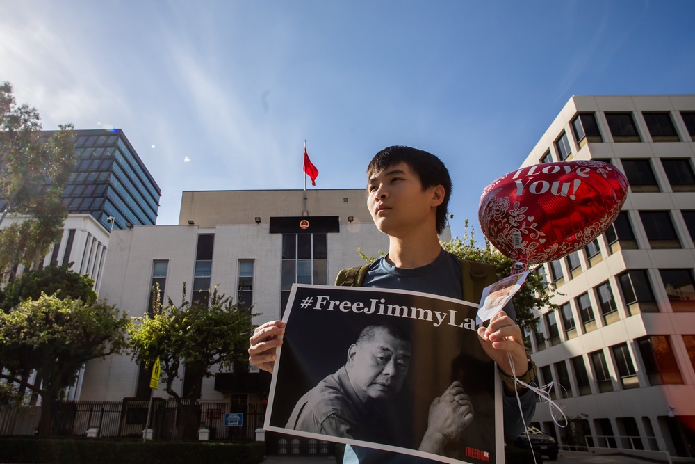 Hong Kong human rights activist Jeffrey Leung protests against the conviction of media entrepreneur Jimmy Lai in February in front of the Chinese consulate general’s office in Los Angeles (Getty)