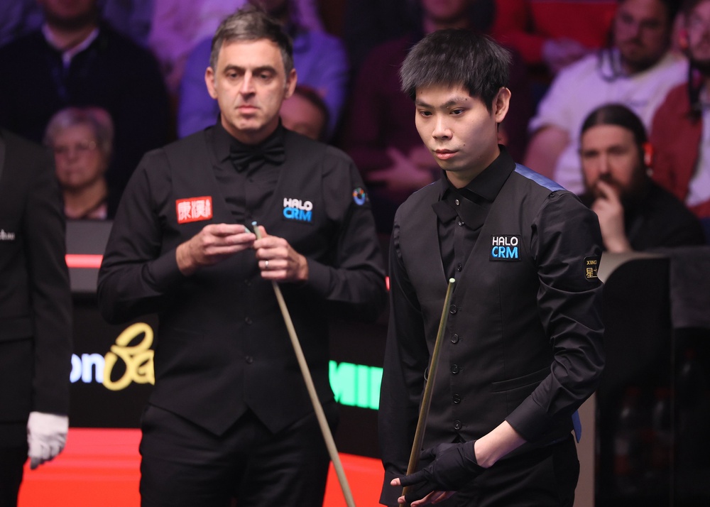Ronnie O’Sullivan (left) took the three frames required to beat He Guoqiang (Richard Sellers/PA) (PA Wire)