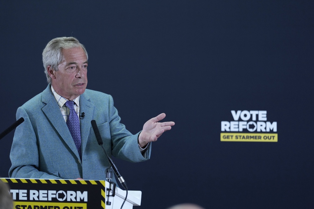 Reform UK leader Nigel Farage speaking at Dodworth Central Social club in Barnsley (PA)