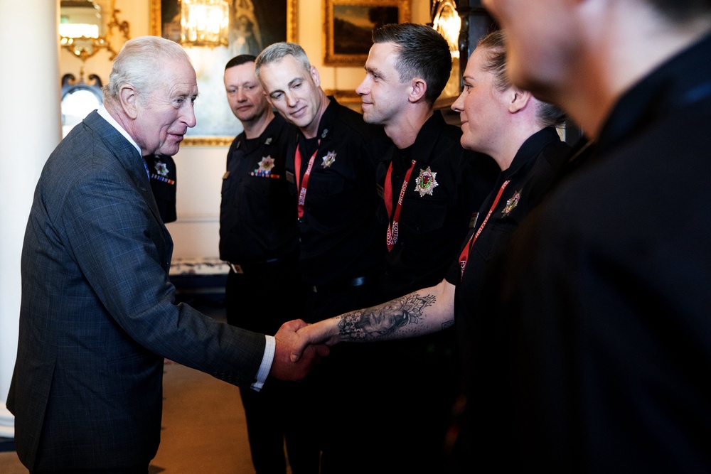 The King meets members of the Scottish Fire and Rescue Service, Police Scotland and frontline workers who assisted in managing the fire at Glasgow Central Station in March this year (Jane Barlow/PA) (PA Wire)