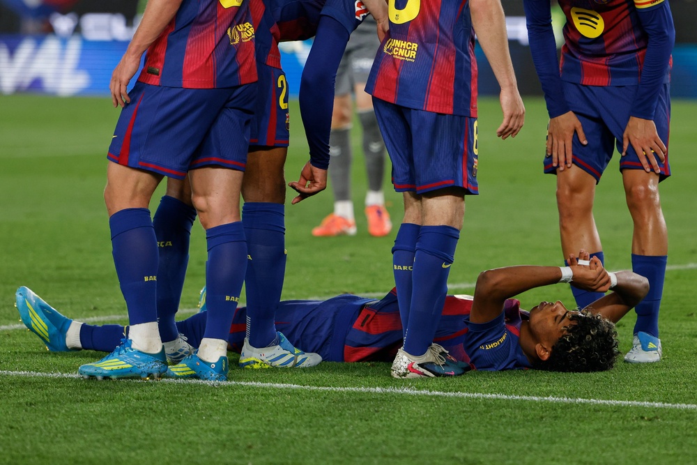 But then was carted off the pitch in a great deal of pain (AP)