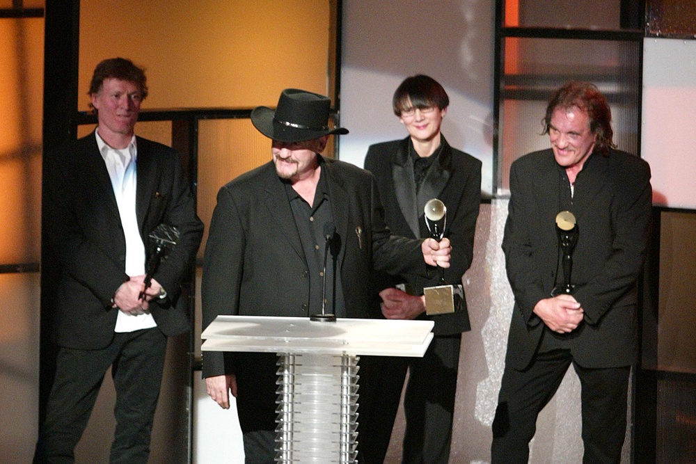 Mason (second left) with Traffic in 2004, as the band were inducted into the Rock & Roll Hall of Fame (Getty)