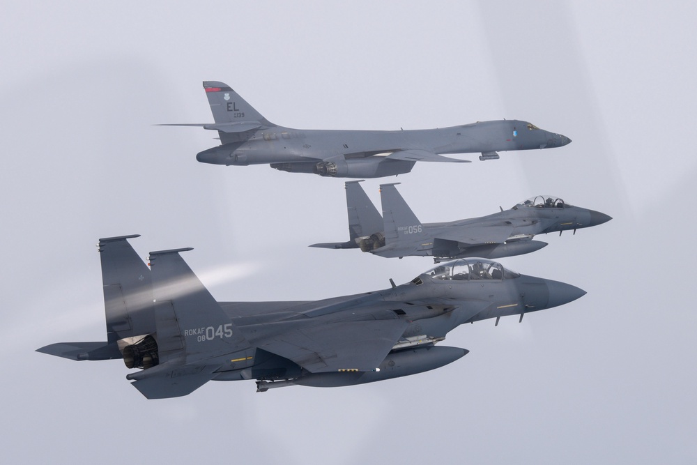 A US Air Force B-1B bomber, and South Korean Air Force F-15K fighter jets fly over South Korea Peninsula during a joint air drill on March 03, 2023 at an undisclosed location in South Korea (Getty)