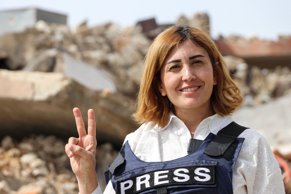 An Israeli airstrike killed the Lebanese journalist Amal Khalil, a veteran correspondent for the daily newspaper Al-Akhbar, in the southern Lebanese border village of al-Tayri on 22 April (AFP/Getty)