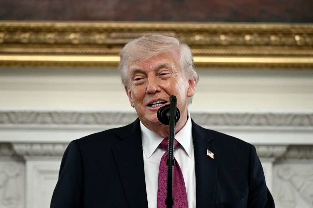 US President Donald Trump speaks during the NCAA Collegiate National Champions Day event at the White House in Washington (AFP/Getty)