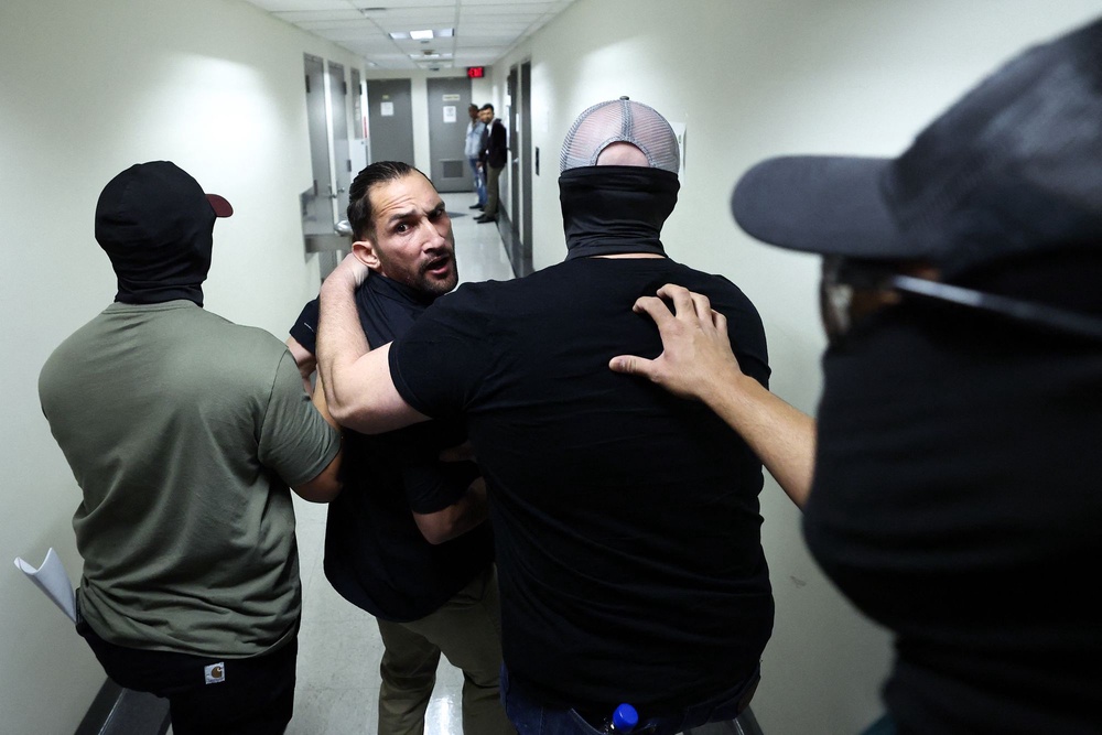 After Trump took office, the DOJ told immigration court judges to grant motions from government lawyers to immediately dismiss immigrants’ cases, making them easy targets for arrest and removal in courthouse hallways (AFP via Getty Images)