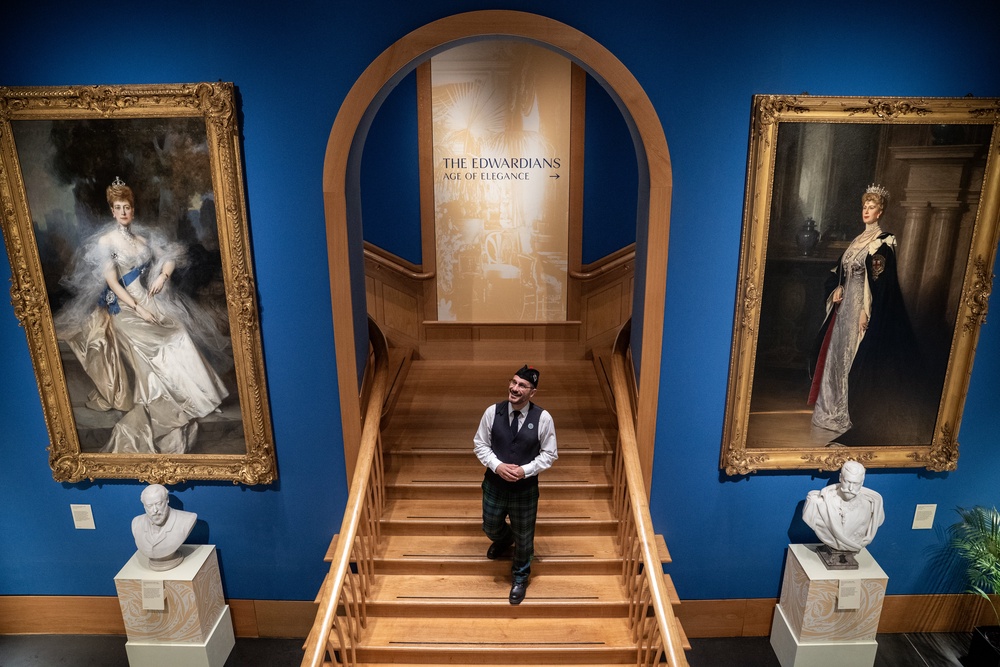 Portraits of Queen Alexandra, left, by Francois Flameng and Queen Mary by William Samuel Henry Llewellyn are also on show (Jane Barlow/PA)