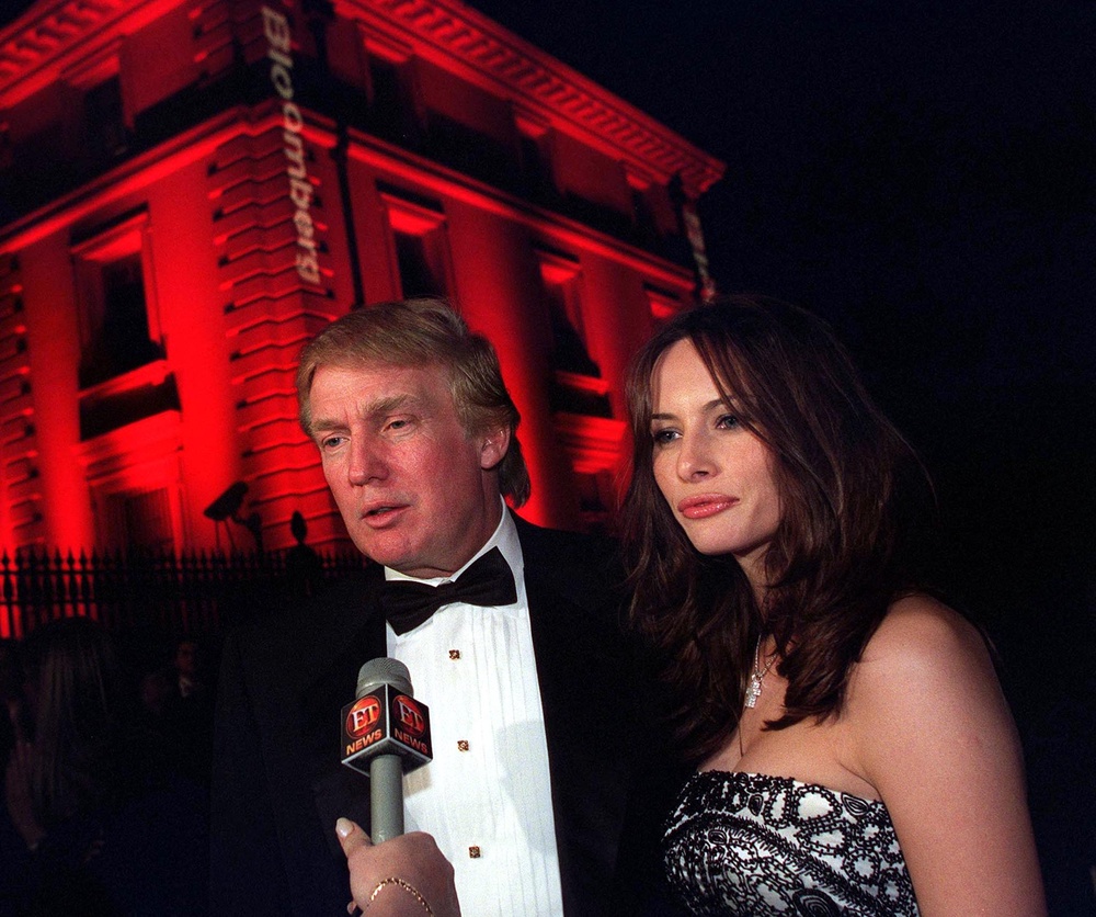 Trump and Melania at the Bloomberg Party after the annual White House Correspondents' Dinner in April 2001 (AFP via Getty Images)