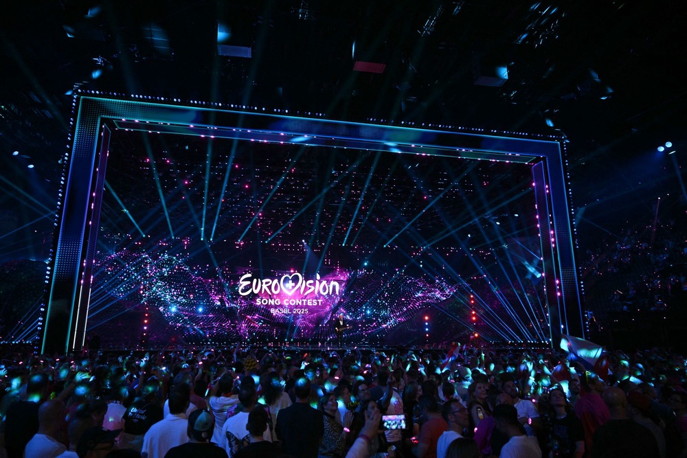 Fans watch the screen at the end of the first semi-final of the Eurovision Song Contest 2025, at the St. Jakobshalle arena in Basel on May 13, 2025 (AFP via Getty Images)