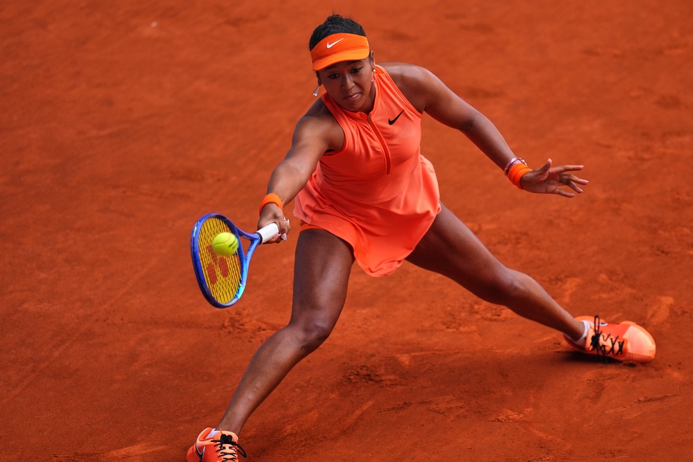 Naomi Osaka slides into a forehand (Manu Fernandez/AP) (AP)