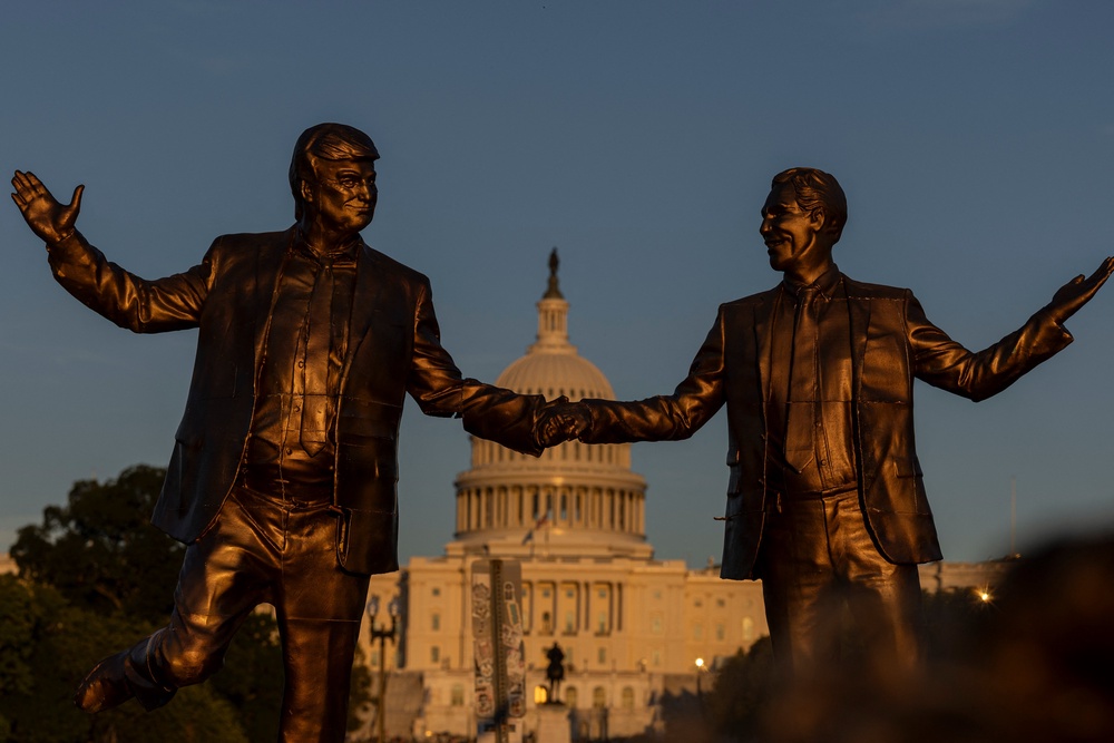 Pranksters previously protested Trump by placing a statue in Washington depicting him holding hands with the late sex criminal Jeffrey Epstein (AFP/Getty)