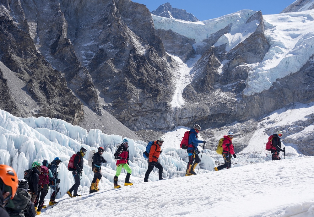 Members of an expedition team hike at Khumbu Icefall in Solukhumbu district, also known as the Everest region, in Nepal (Reuters)