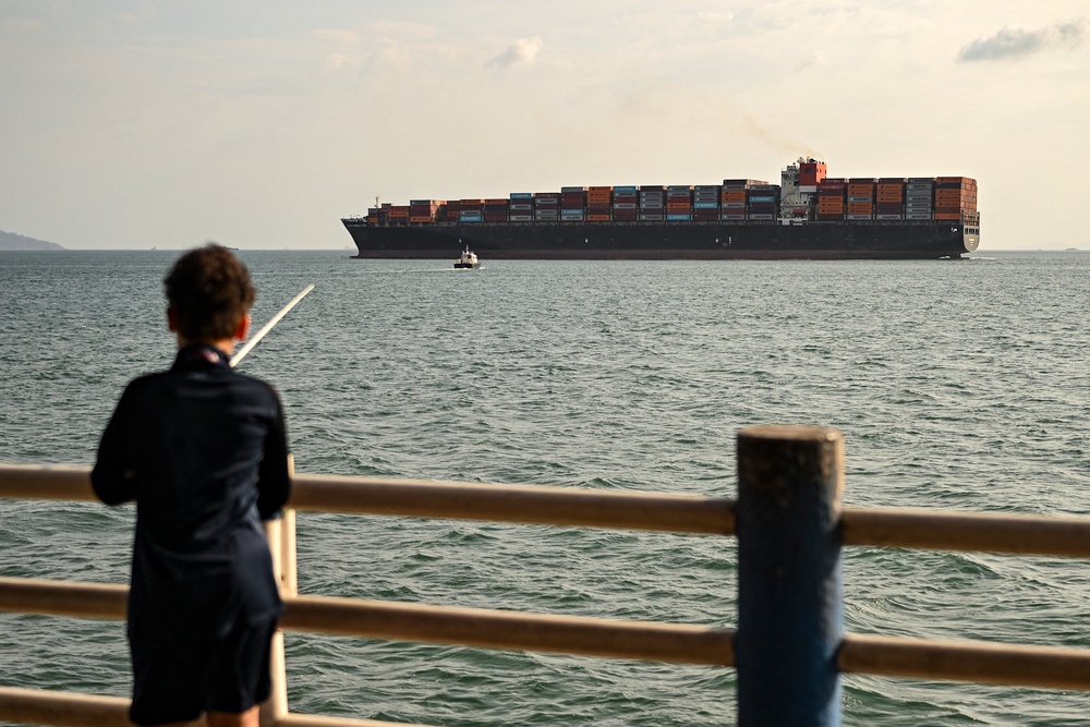 While passage through the waterway usually comes at a flat rate via reservations, companies without reservations can cross by paying an additional fee in an auction for slots, which are awarded to the highest bidder rather than waiting for days off the coast of Panama City (AFP/Getty)