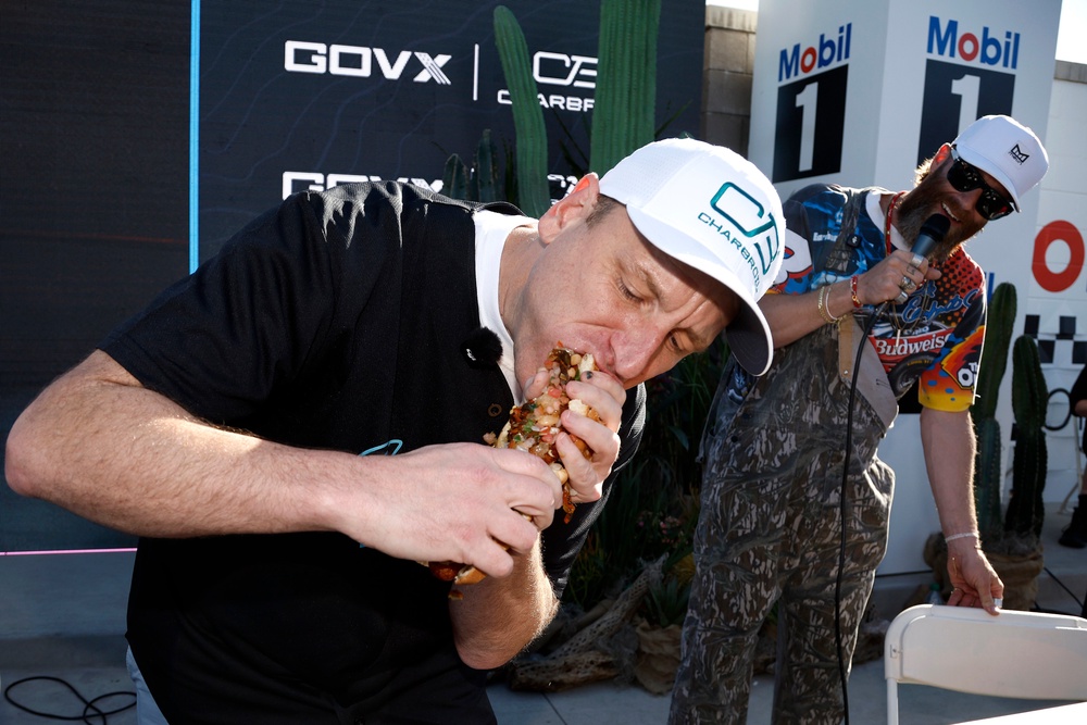 Competitive eater, Joey Chestnut, competes in a hot dog eating contest in March in Avondale, Arizona. Hot dogs and other processed meats have been tied to poor memory (Getty)