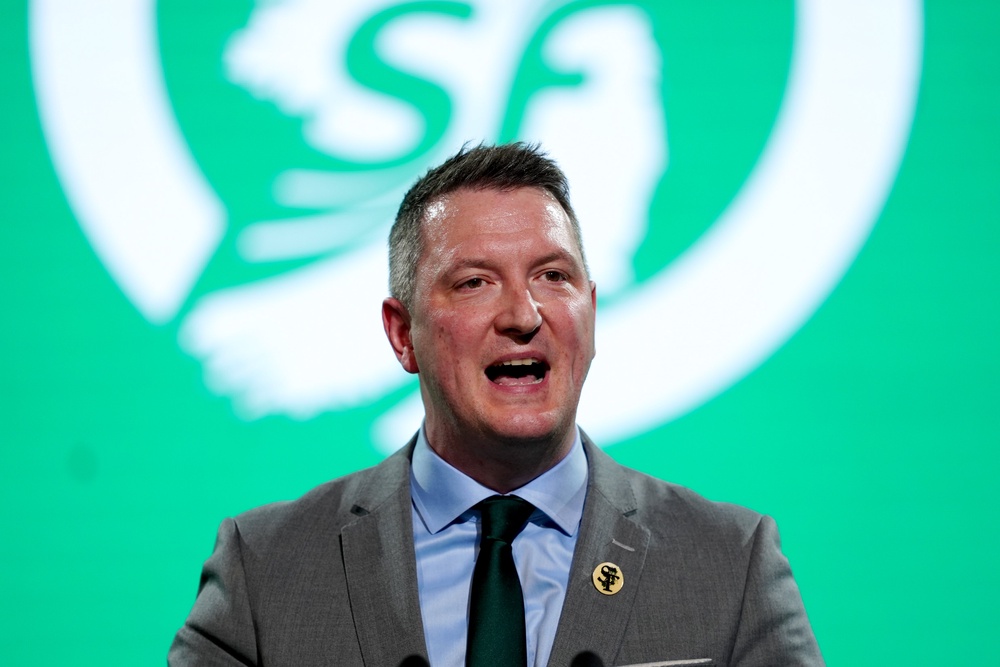 Ms O’Neill was introduced by party colleague John Finucane (Brian Lawless/PA) (PA Wire)
