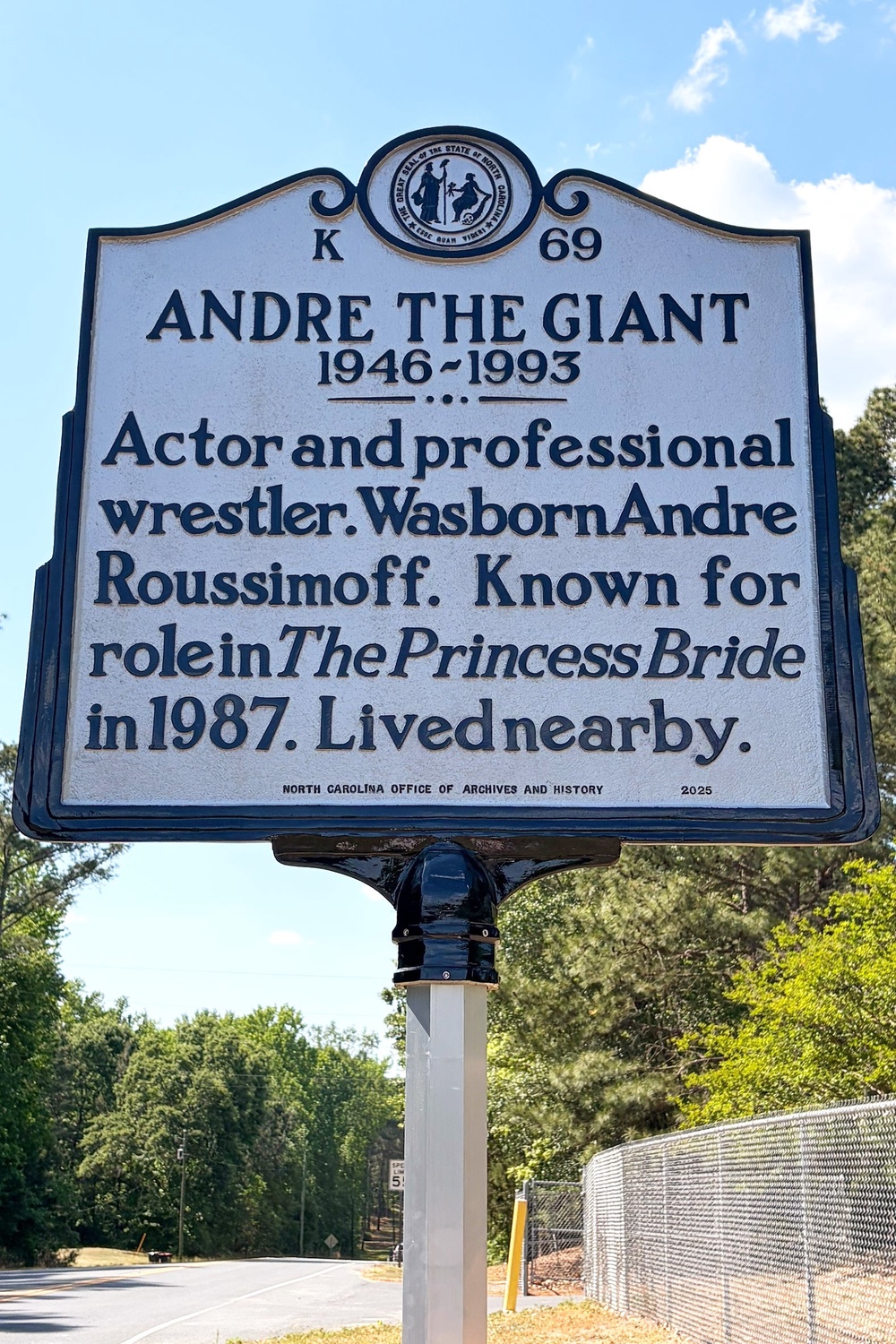 This photo provided by the North Carolina Department of Natural and Cultural Resources shows a newly-erected historical marker celebrating Andre the Giant along a highway near Ellerbe, N.C., on Thursday, April 23, 2026 (Leslie Leonard/North Carolina Department of Natural and Cultural Resources via AP)