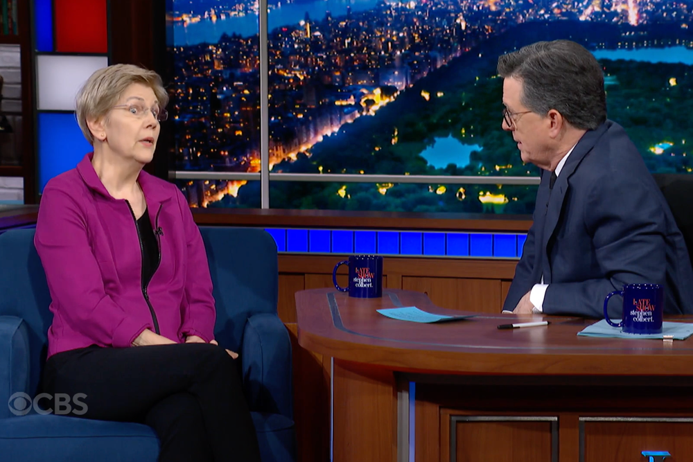 Warren roles her eyes in dismay as Colbert asks her about attitudes towards the war in Washington (The Late Show/CBS)