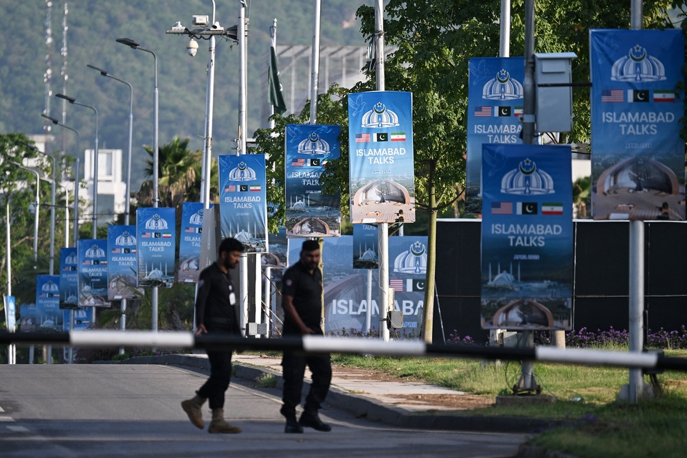 Posters of 'Islamabad talks' in Pakistan's capital dot roads (AFP/Getty)